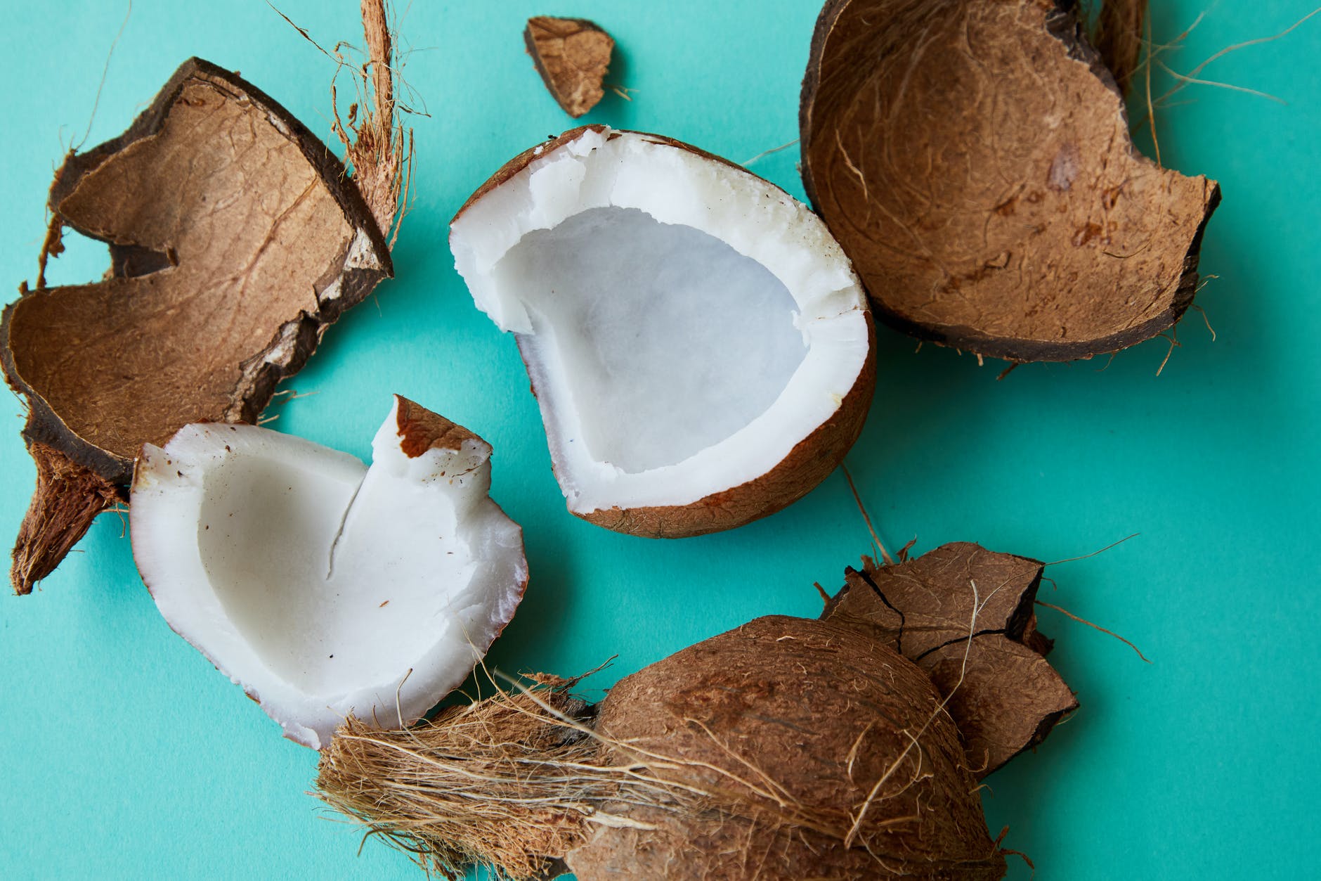 pieces of cracked coconut with aromatic white pulp