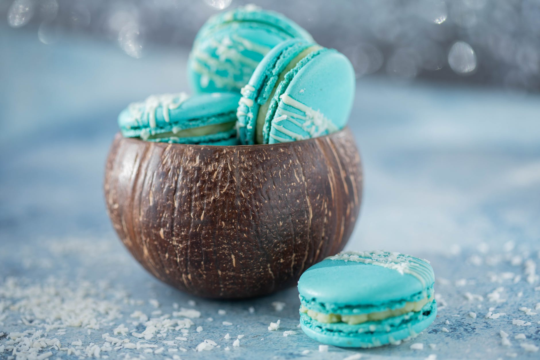 delicious macaroons in coconut shell